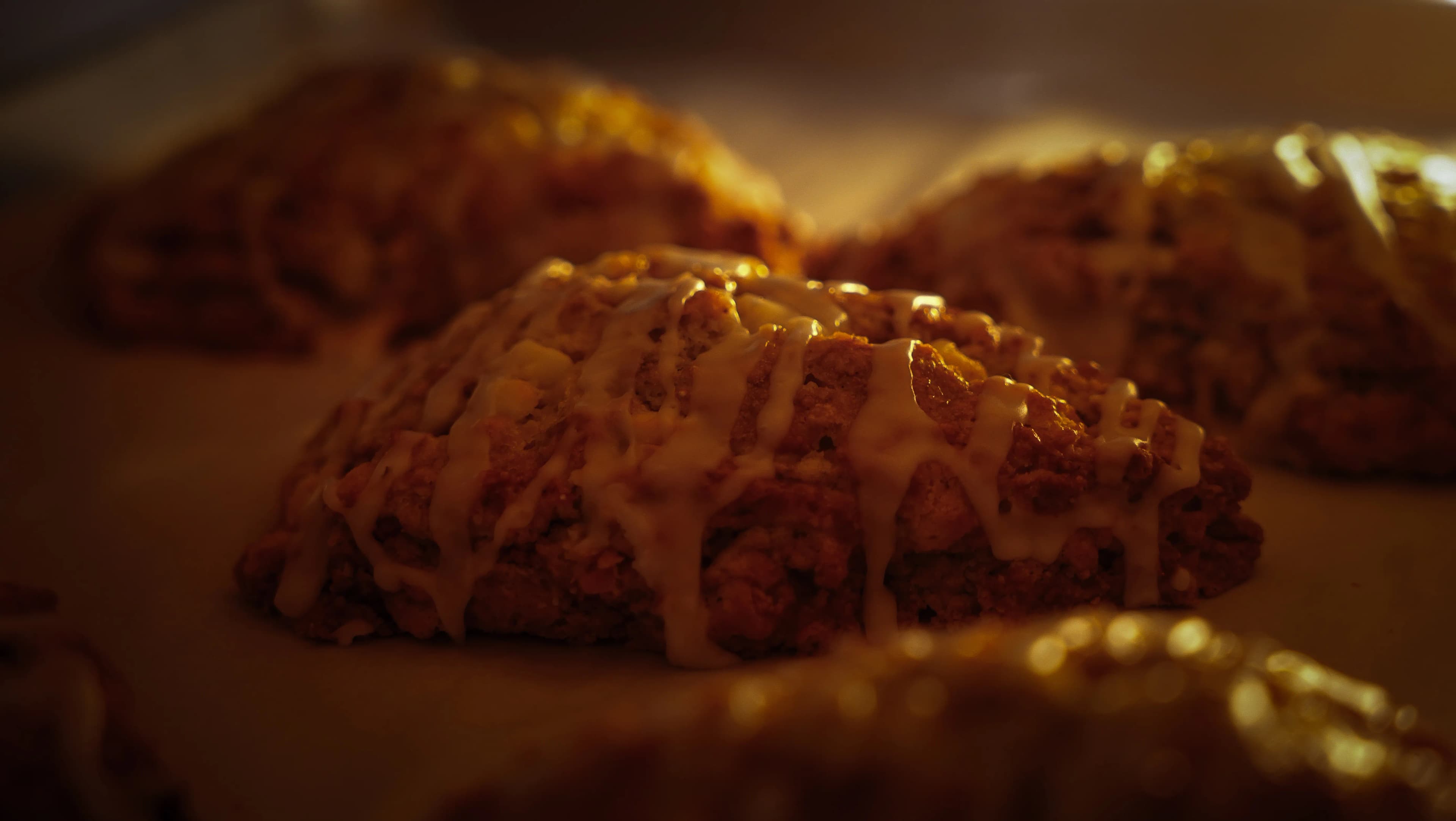 Fresh glazed scones drizzled with white icing